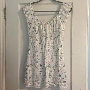 A very cute flower-patterned sundress size S, worn only two times